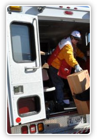 American Red Cross staff unloading boxes from a truck
